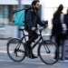 Food delivery riders call on platforms to open up AI ‘black box’ they say has cut pay